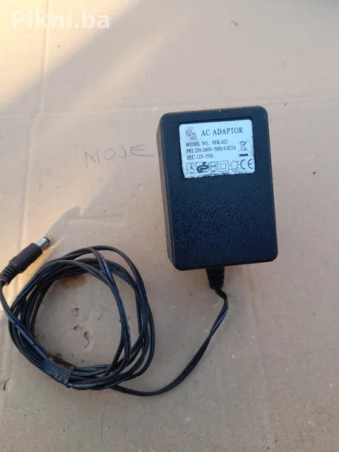 AC/AC ADAPTER 12V ~ 5VA (model NFK-023) prtevarač ispravljač punjač 6