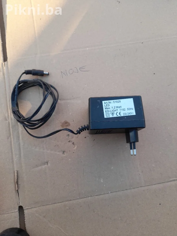 AC/AC ADAPTER 12V ~ 5VA (model NFK-023) prtevarač ispravljač punjač
